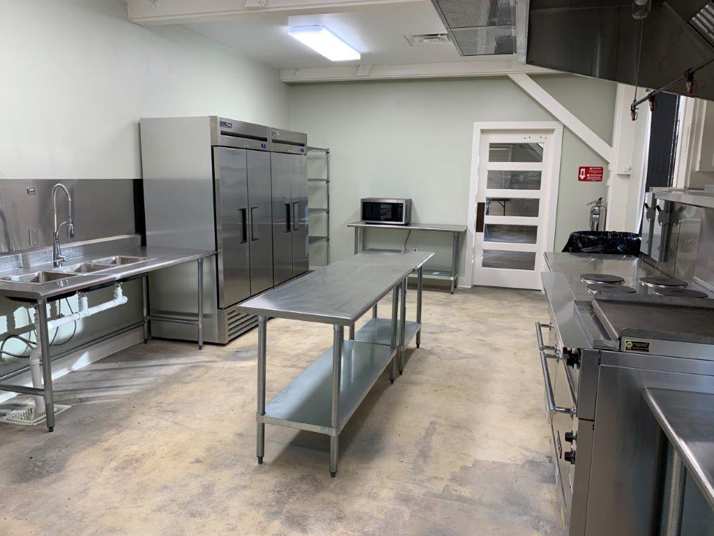Kitchen refrigerator, microwave and stove. 