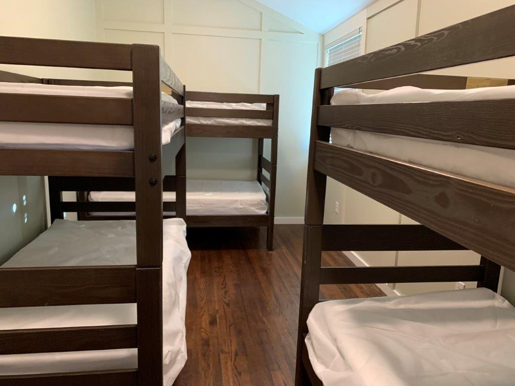 Room with five sets of twin bunks 