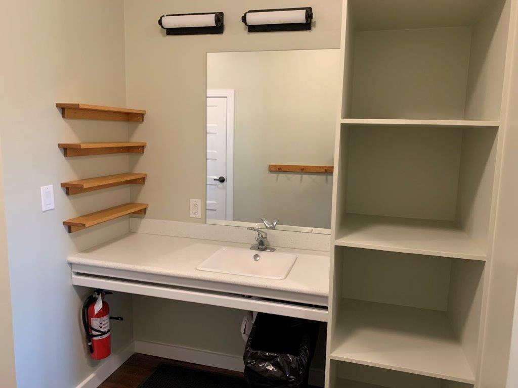 Sink outside bathroom area