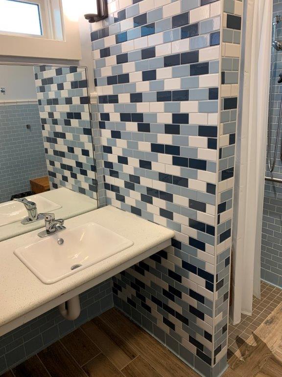 Dorm bathroom sink and shower