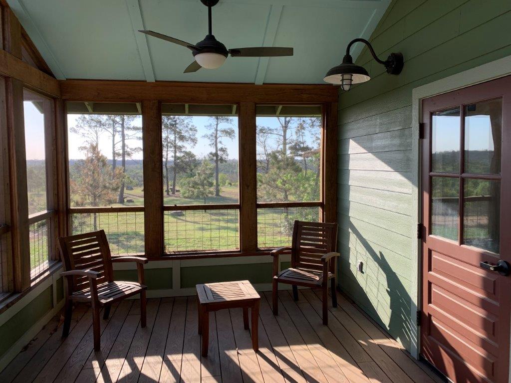 Inside Dorm 1 screened porch.