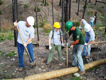 Volunteers working on a trail