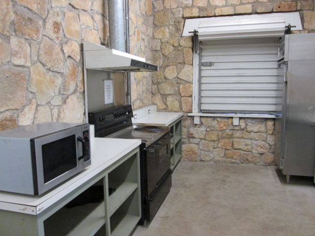 The kitchen area with the serving window closed. 