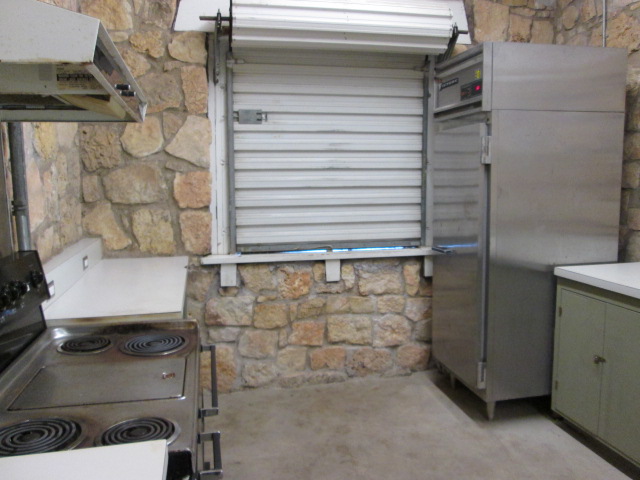 The kitchen area with the serving window closed.  