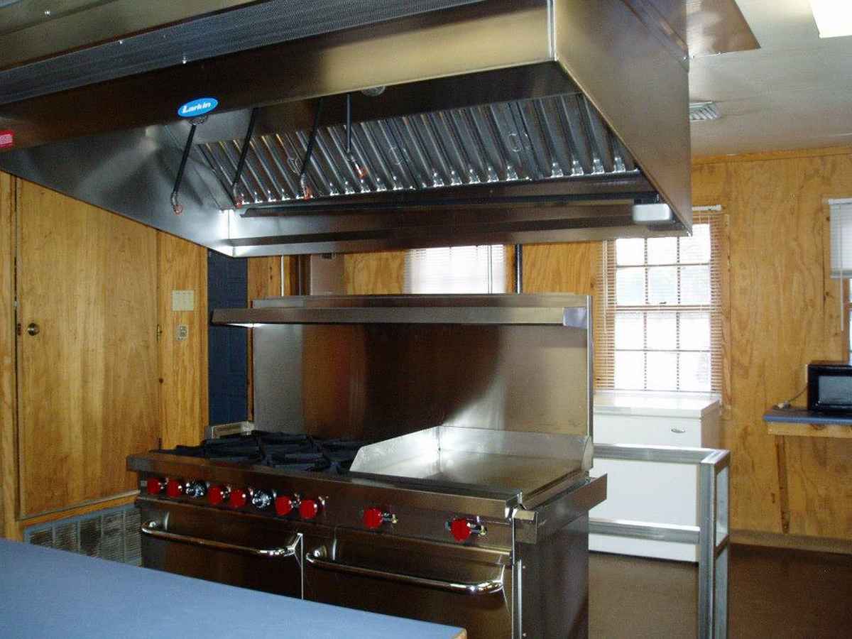 Looking at the commercial stove in the Dining Hall kitchen. 