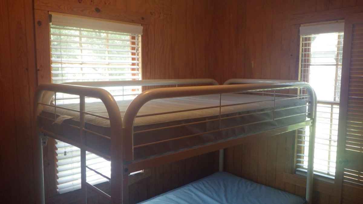 A bedroom in a barracks. 