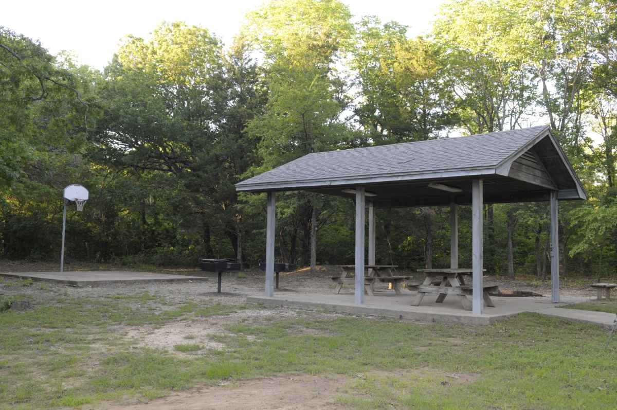 This pavilion and basketball court come with this facility.  