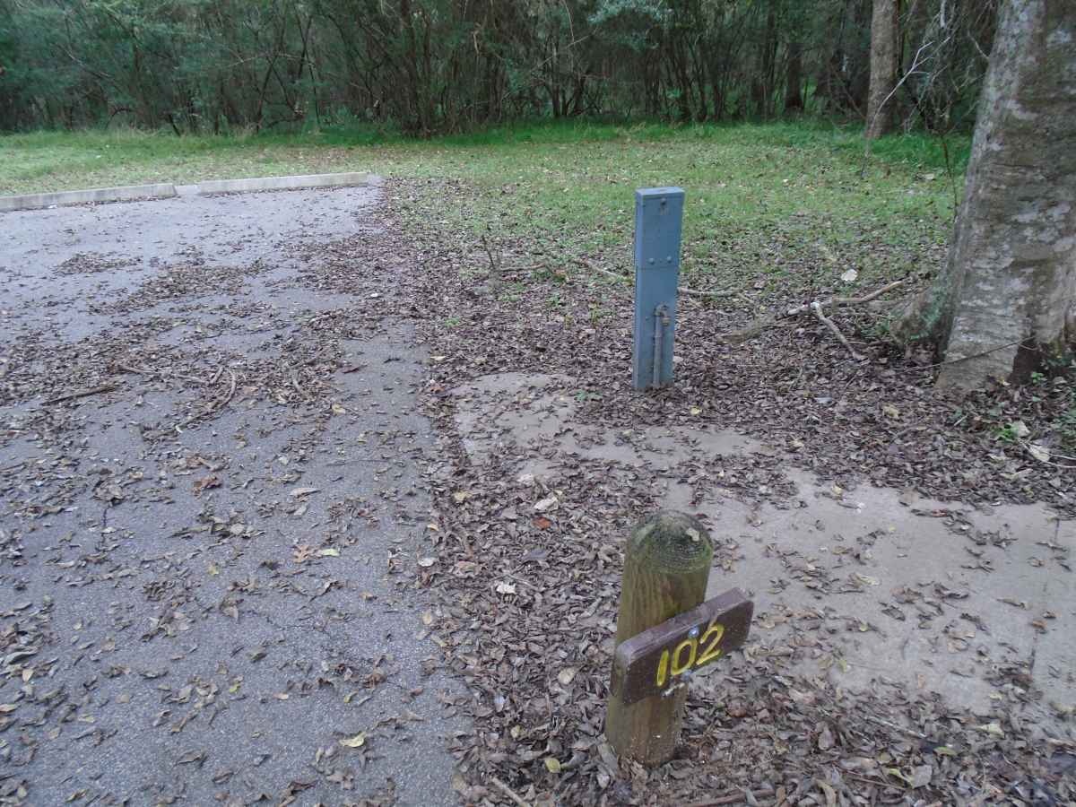 The electrical connection and the water spigot at Campsite #102 in the Burr Oak Camping Area.