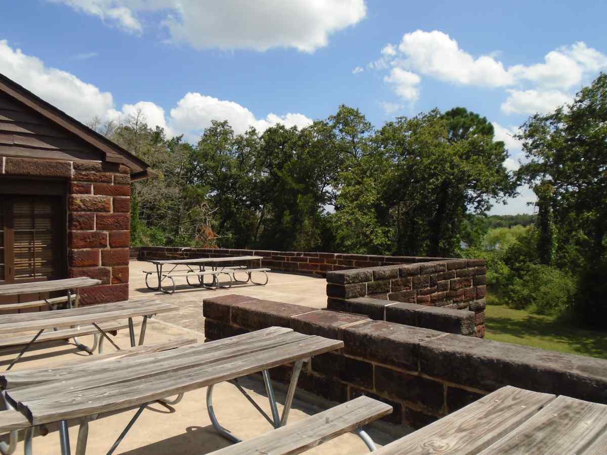 There are plenty of picnic tables in the back and sides of the Recreation Hall. 