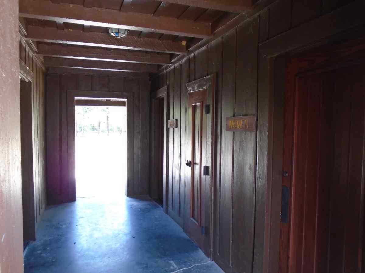 The bathrooms and side door of the Group Recreation Hall. 