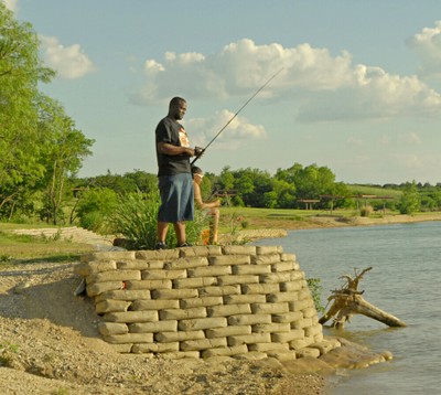 couple fishing from bluff.jpg
