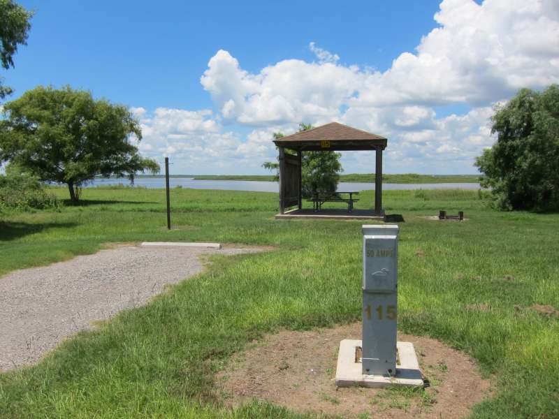 Site #115, a campsite with electric and water hook-ups. 