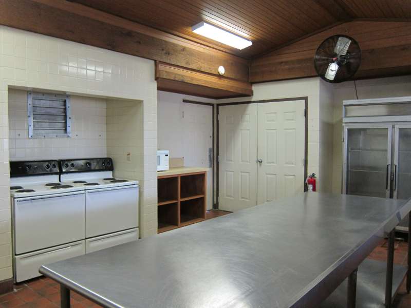 Lots of shelves, prep area, and a commercial refrigerator.  