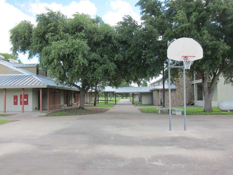 This outdoor basketball court is in the Sports Complex Area behind the Gymnasium/stage and near the Dining Hall and Interpretive Center.