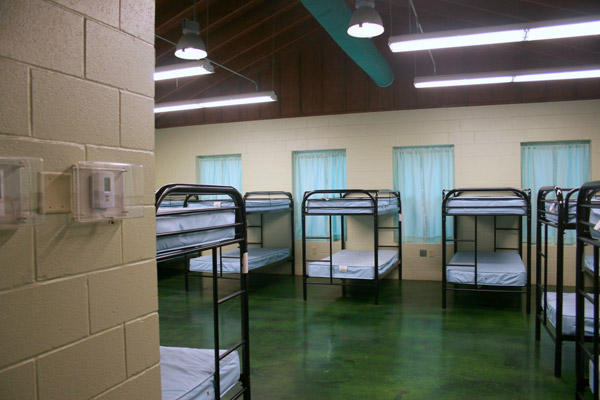 View of the Barracks bunk-beds from the entry. 