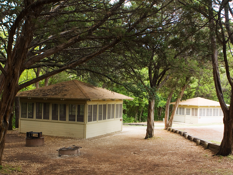 Outside the Screened Shelters.