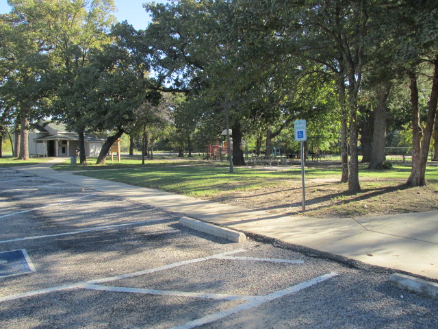 Bathrooms and playground near pavilion.