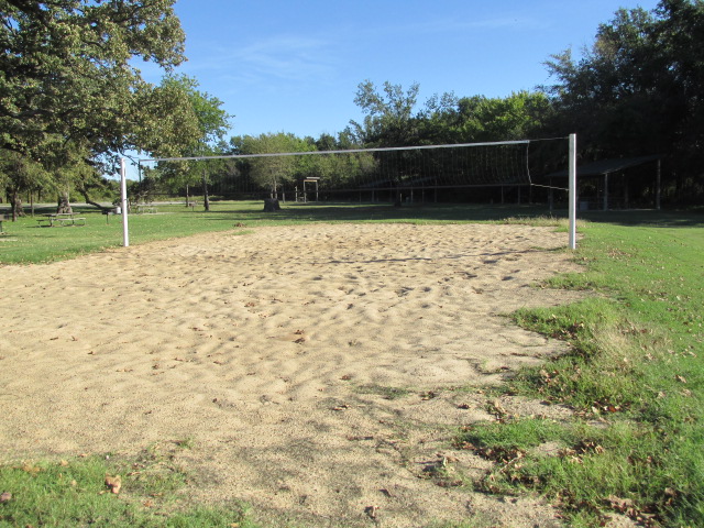 Volleyball court near picnic pavilion.