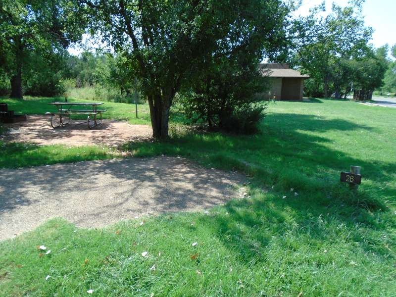 Campsite #26, with the bathrooms in the background, in the Kiowa Camping Area.