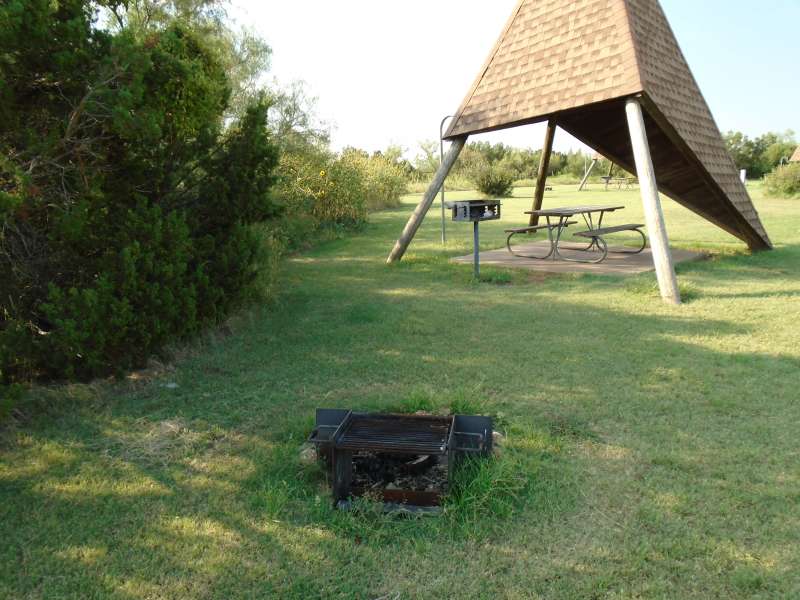 Campsite #10, with water & electricity, in the Comanche Camping Area.