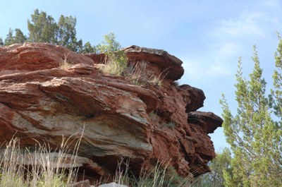 Streaks of raw copper showing in cliff face