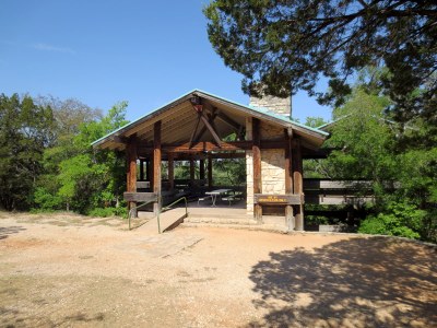 Pavilion parking with steps and ramp up to first level.