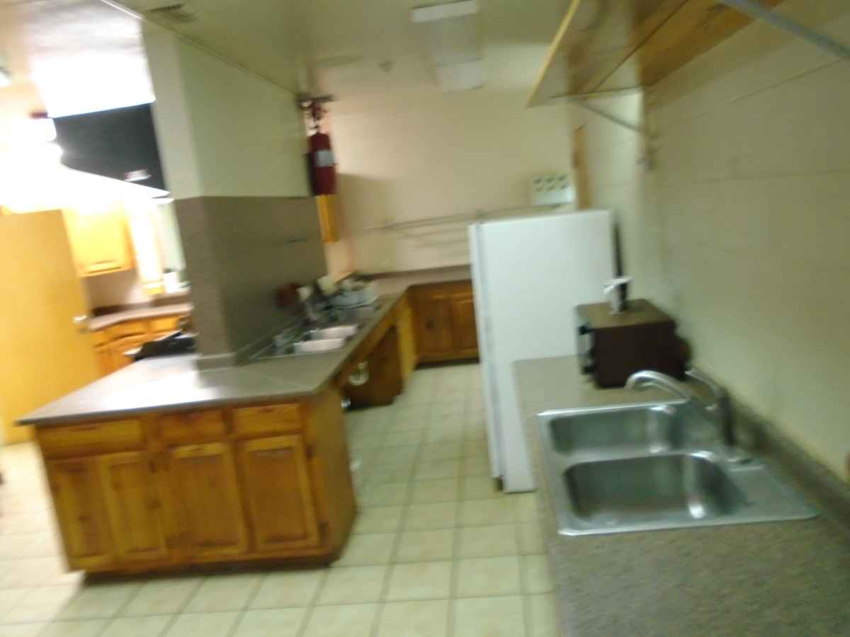 There are two double sinks in the kitchen. 