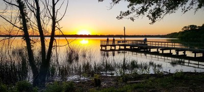 Sunset over the Fort Parker State Park wheelchair accessible fishing pier 