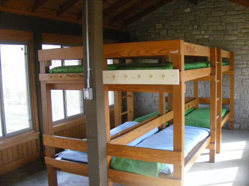 Inside one of the four Shelters with A/C, heating, and four sets of bunkbeds.