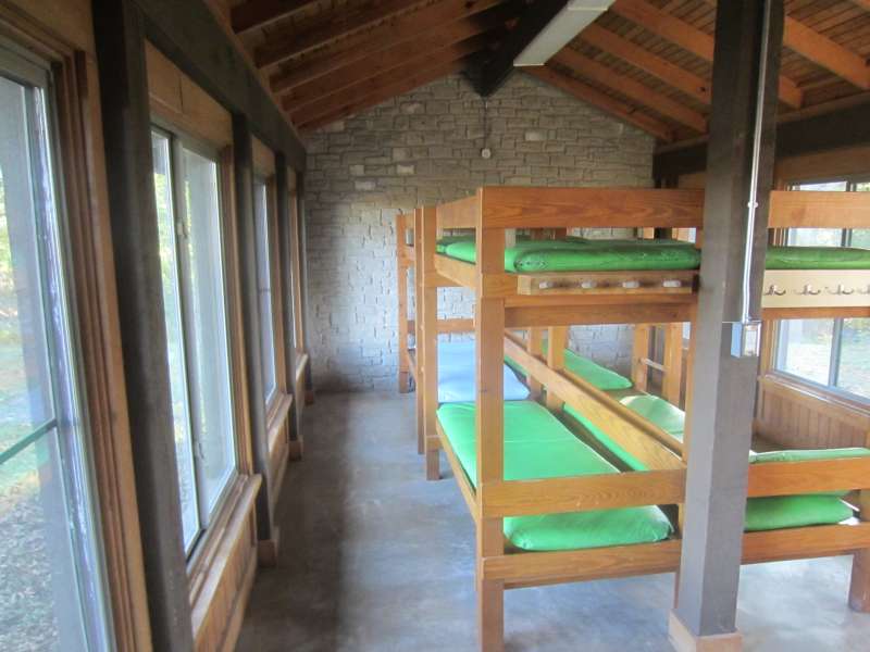 Inside one of the four Shelters with A/C, heating, and four sets of bunkbeds.