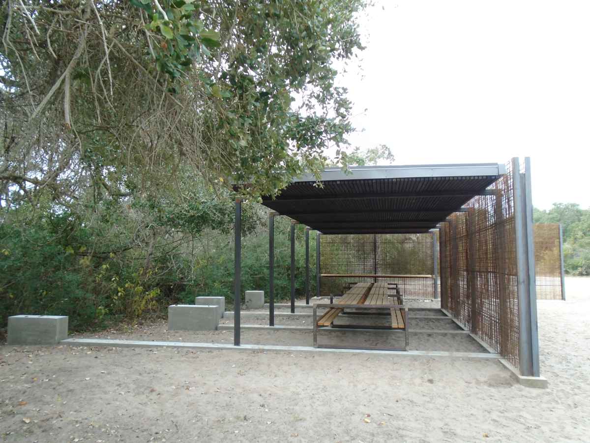 Group picnic table with shade shelter.  