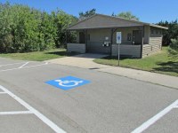 Designated parking area and restroom building.