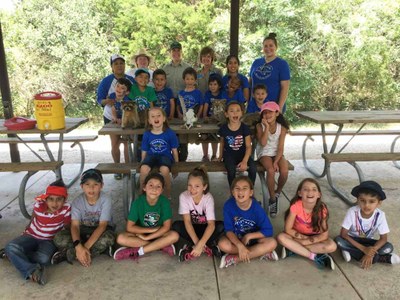 Field Trip Group at GCSNA Group of young students posing for a photo at a picnic pavilion.