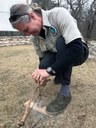 Volunteer demonstrating fire-building