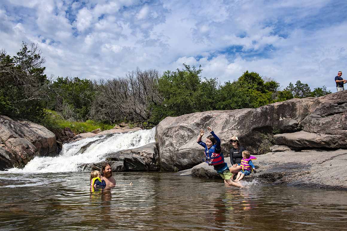 Family swimming at Inks Lake