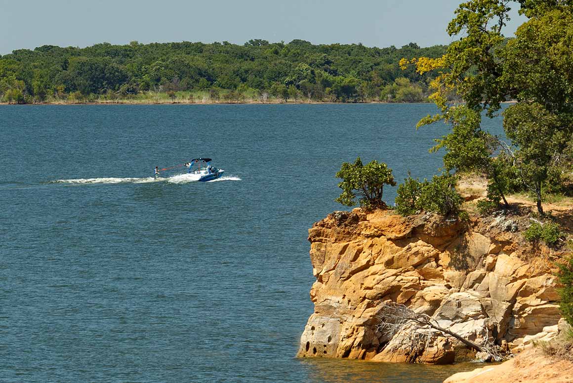 Boat pulling water skier on Lake Ray Roberts