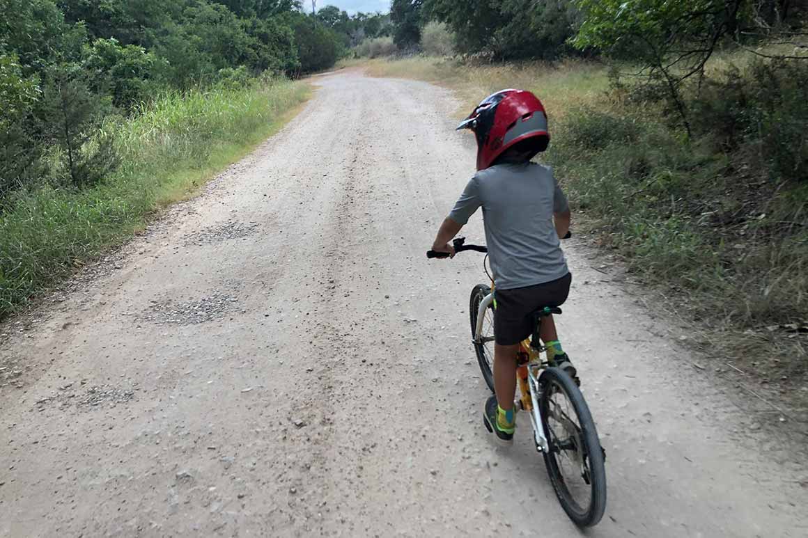 Theo riding his bike Colorado Bend State Park