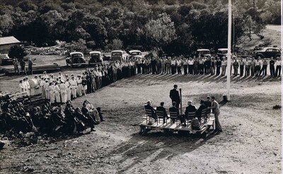 historic photo of flag-raising ceremony