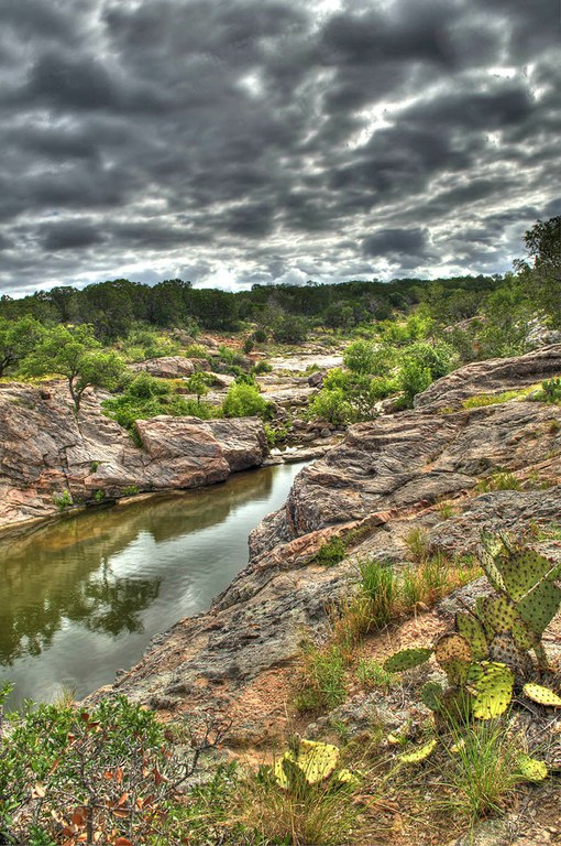 View of rock outcrops with water in between.