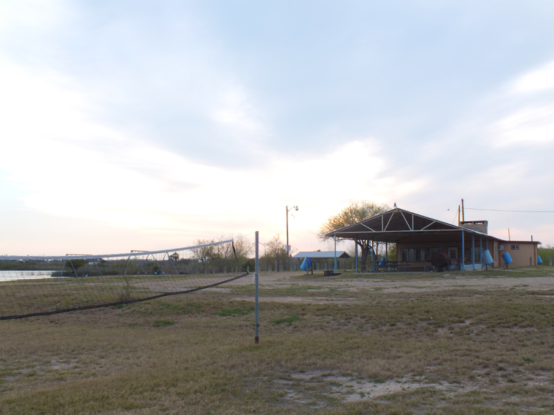 The Volleyball court outside the pavilion's  patio. 