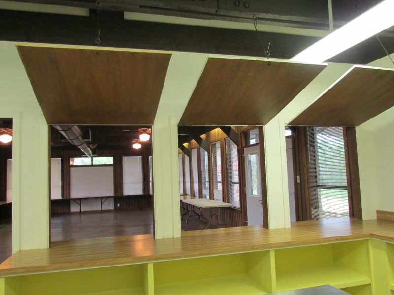 Panels drop down to separate kitchen from hall.