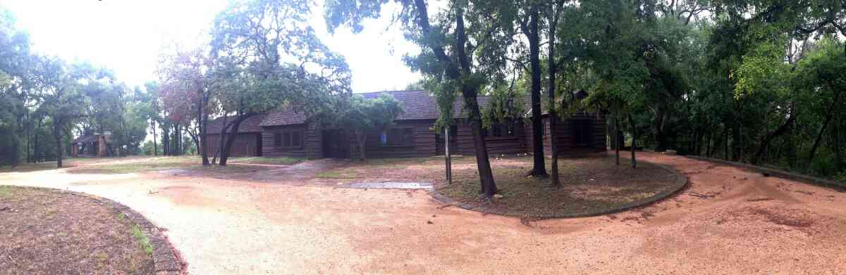 A panoramic photo  of the Rec. Hall at Lockhart State Park.