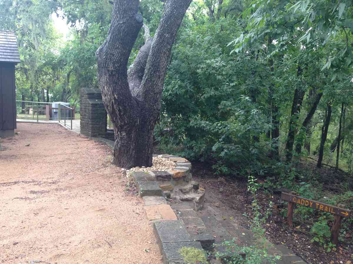 A view of the south side of the Rec. Hall and the Caddy Trail.  