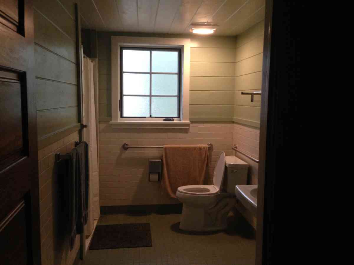 The inside bathroom with a shower.   
