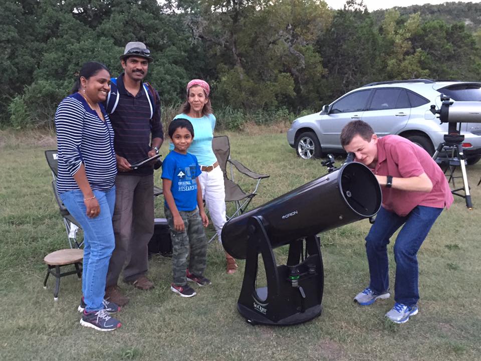Looking through a telescope at Lost Maples State Natural Area. 