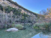 Hillside beyond shallow stream - slight color