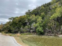 Hillside next to road without color