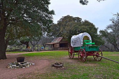 On the grounds of the Sauer-Beckmann Farmstead (covered wagon) 