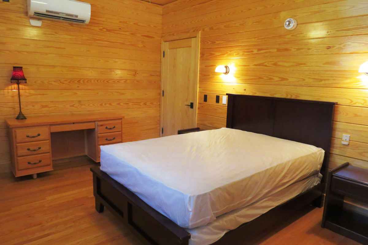 The cabin has four bedrooms; one is ADA accessible (designed to be usable by people in wheelchairs) with a full-sized bed.  