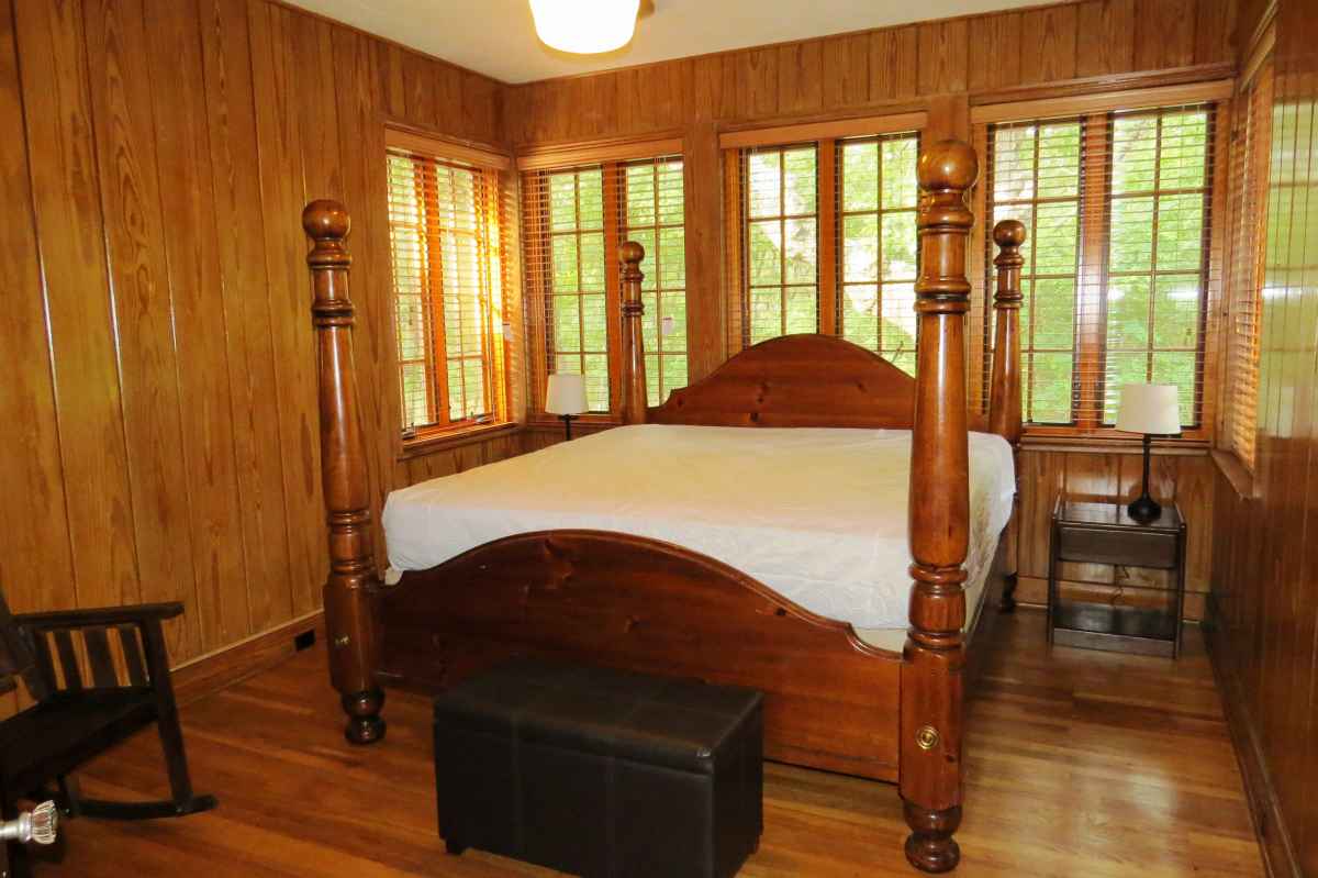 The cabin has four bedrooms; one has a king-sized bed.